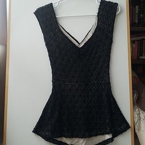 Deletta peplum black dressy top